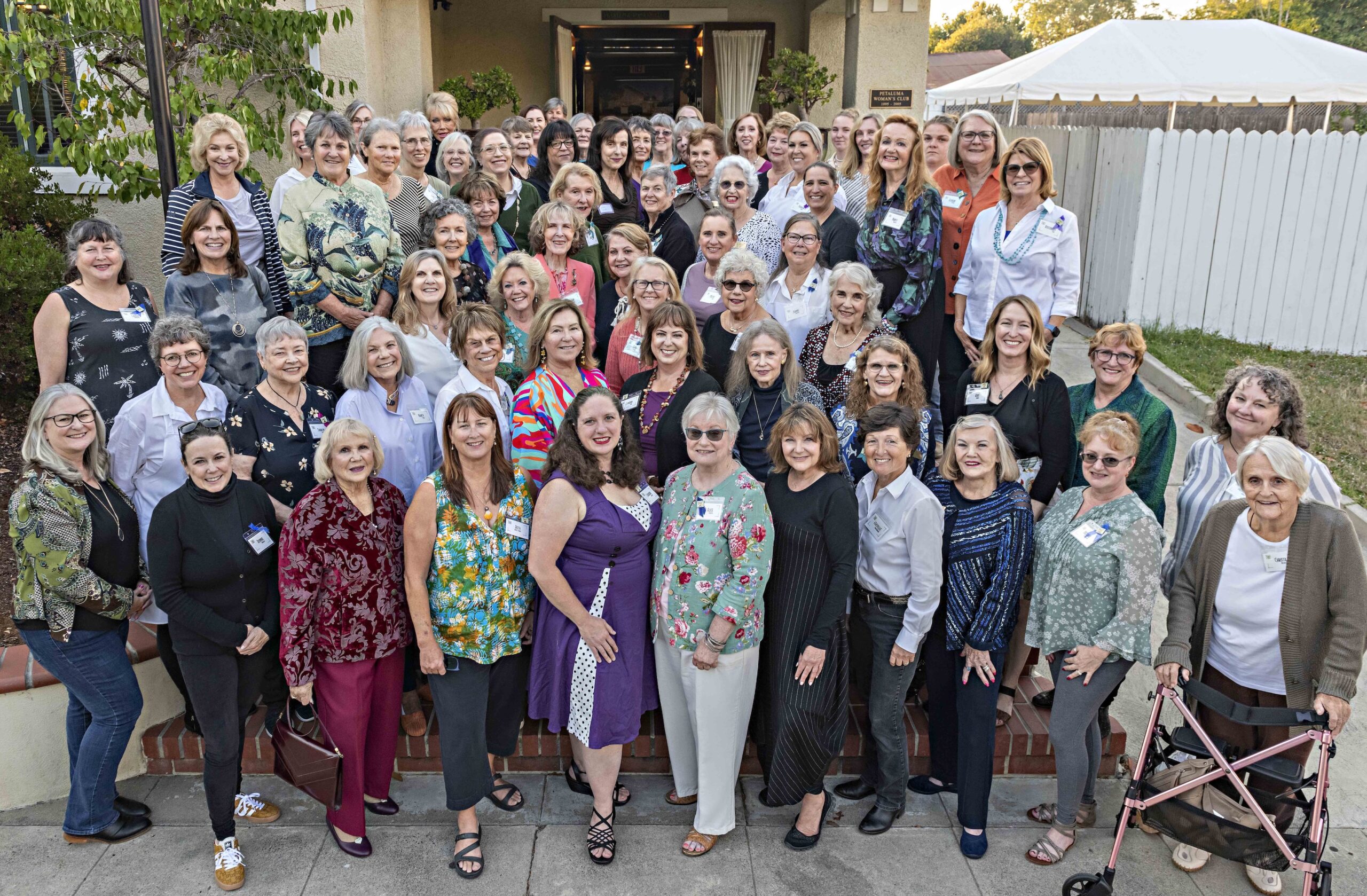 Sept 2023 pic of PWC club members standing on steps in front of the clubhouse.