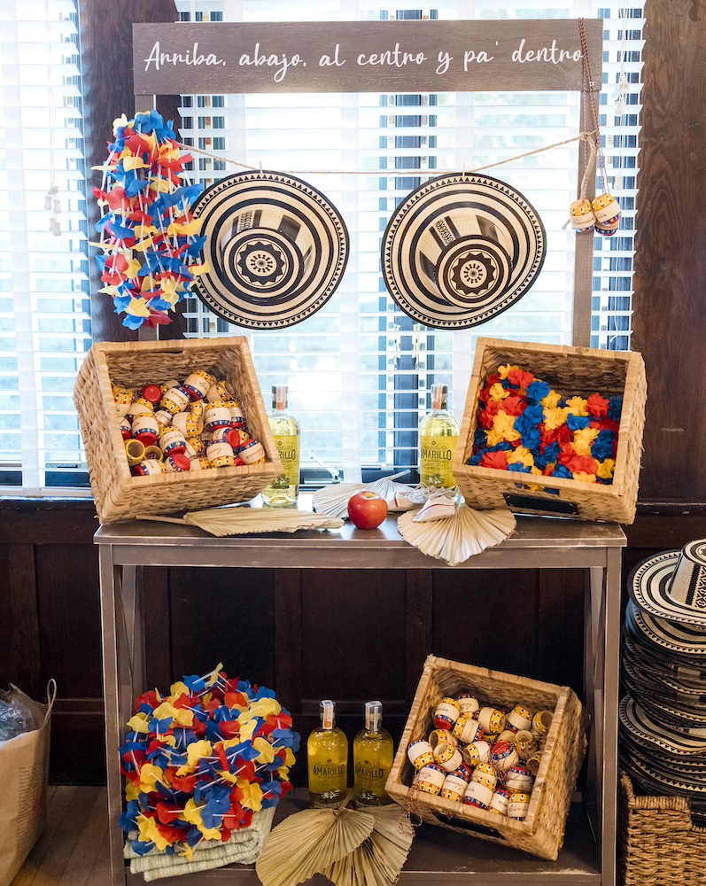 Gift stand for attendees at wedding with a Hispanic theme